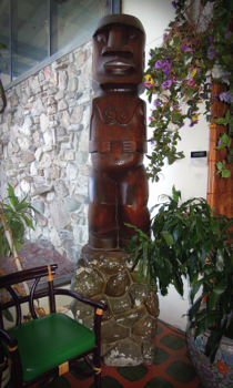 One of two identical large tikis in the waiting area